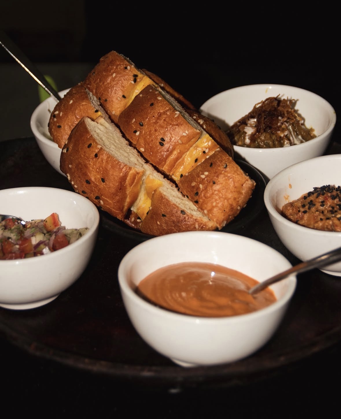 Sesame bread with Persian dips and mezze